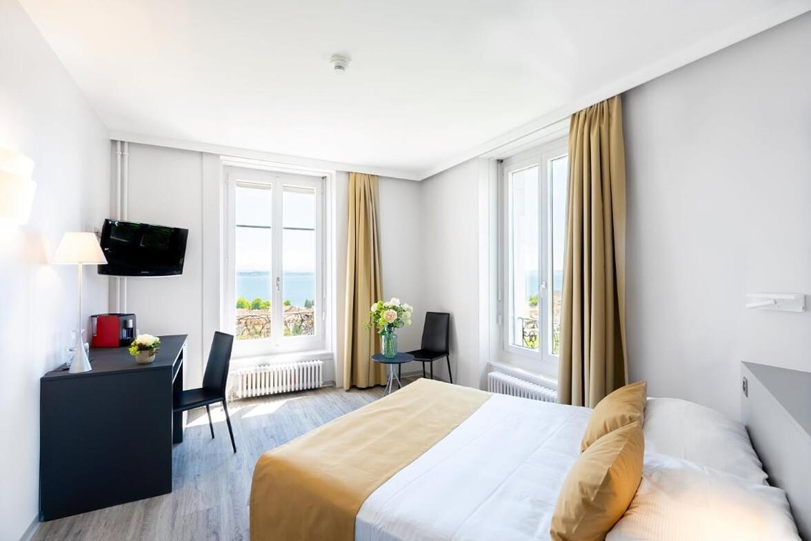 Hotel Alpes & Lac เนอชาแต็ล ภายนอก รูปภาพ